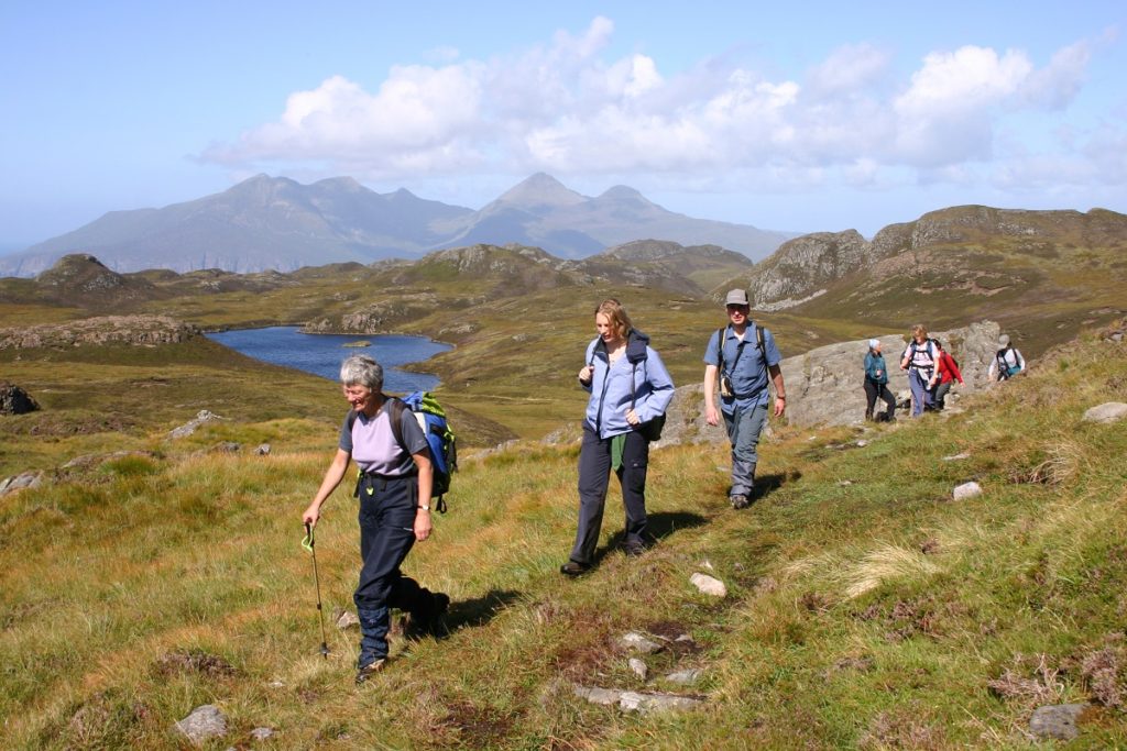 Hiking on Eigg with Rum behind