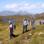 Hiking on Eigg with Rum behind