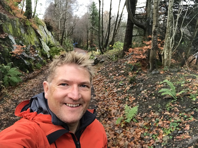 Robin hiking around St Fillans